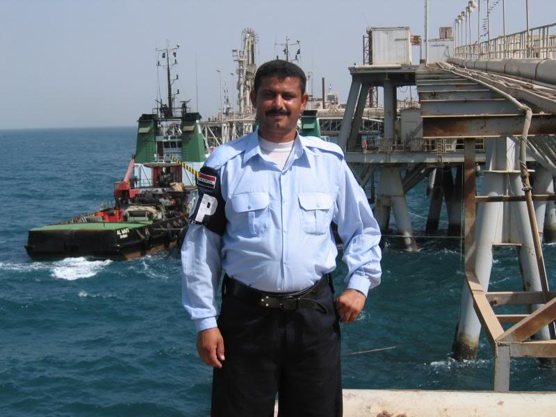 fat iraqi policeman