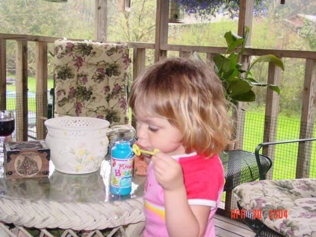 Chloe blowing bubbles