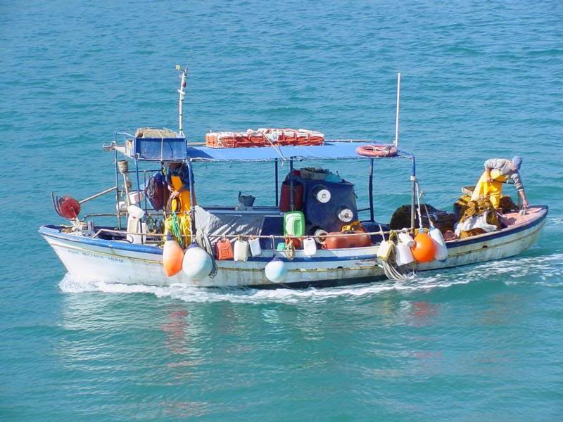 Fisherman, Poros, Greek Islands, www.stormc.co.z a