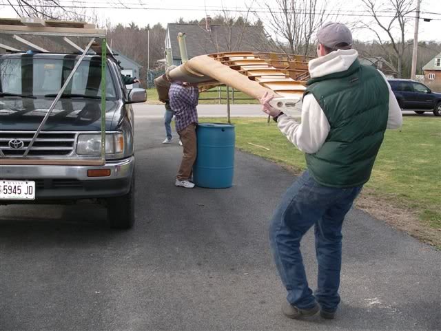 lifting the wing back on the roof rack