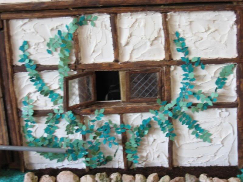 iny on wall of tudor house (side)