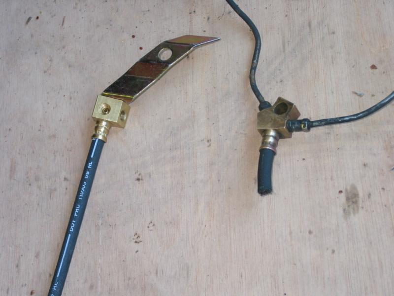 V8 rear hose on left. 6cyl rear hose remnant on righ...