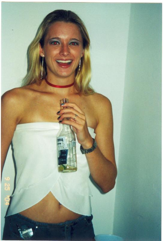 Heather, looking gorgeous, and playing beer pong!!