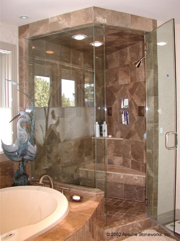 Shower in brown marble with copper accents