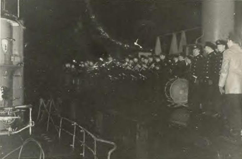 U-354 enters a bunker.