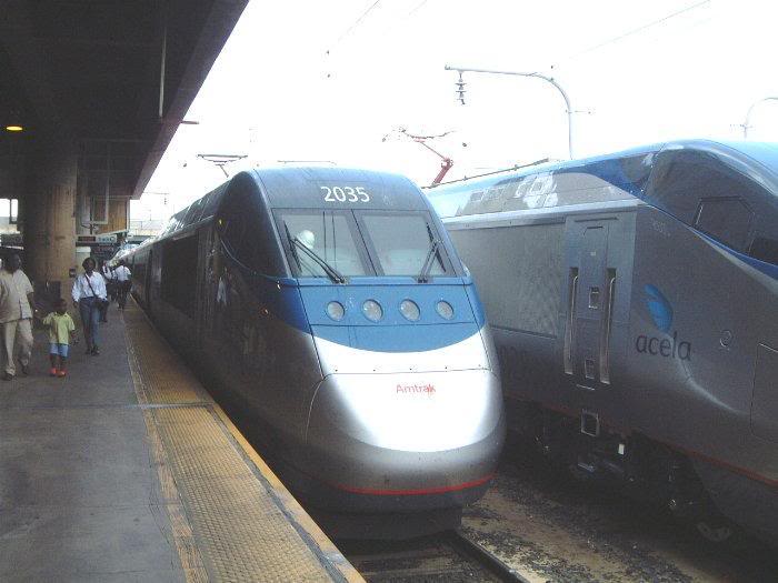 front of Acela Express