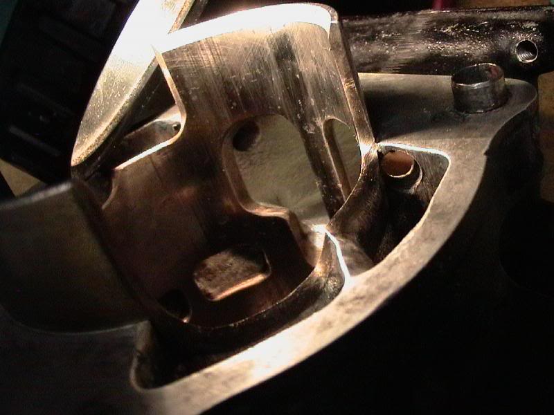 Auxillary worm transfers from intake track drilled in. ...