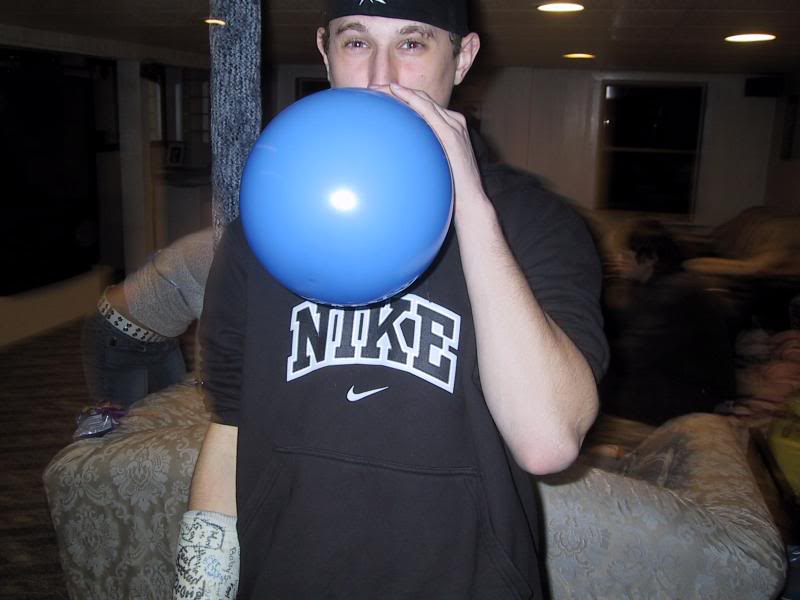 Karl blowin up balloons
