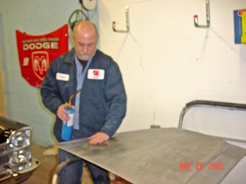 Shrinking the 'oil can' dents in the hood