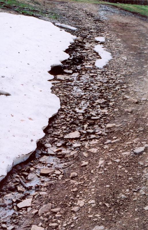 Rocks and erosion on upper Run-out ski slope, April 20,...