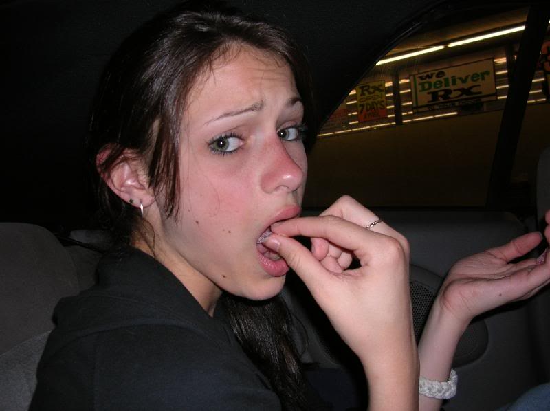 Maya eating Sour Patch Kids while driving to The Grove