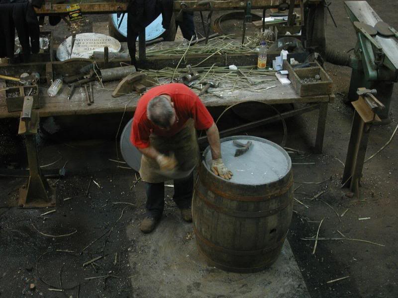 Cooper building a cask