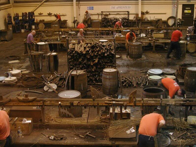 Coopers at work, making barrels for the maturation of M...