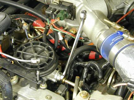 Remove fuel line nut