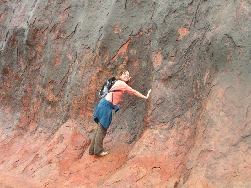 Uluru base 15 - Juje touches the rock!