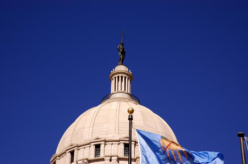Flag And The Guardian Atop The Capitol Dome of Oklahoma
