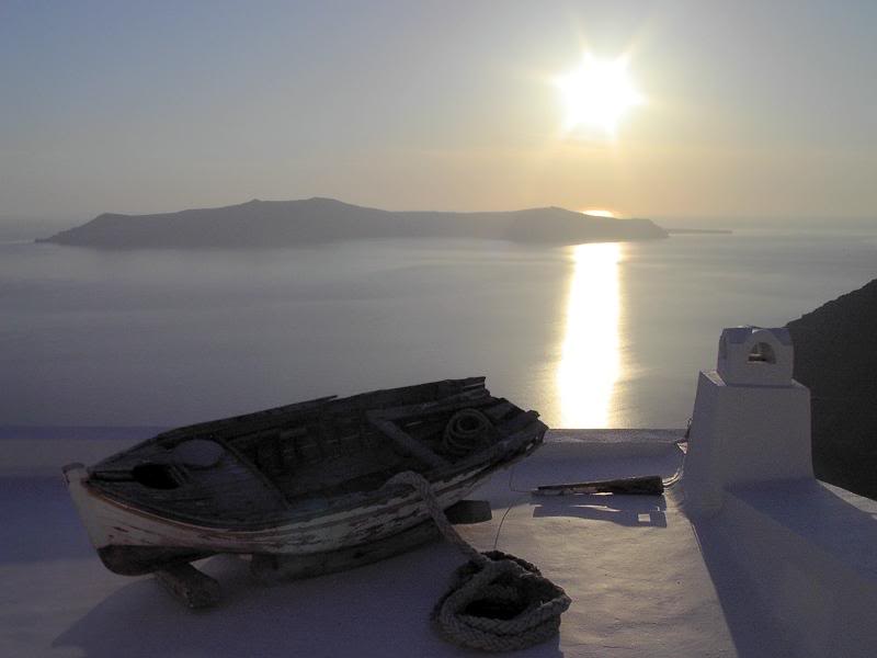 Fira - boat, sunrays.
