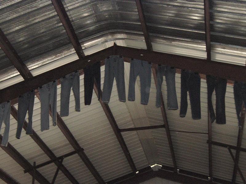 Jeans hang from the ceiling of the Commercial Exhibit H...