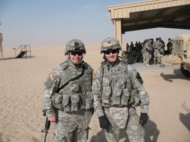 LT Josh Arthur, CC 04, with buddy in Kuwait