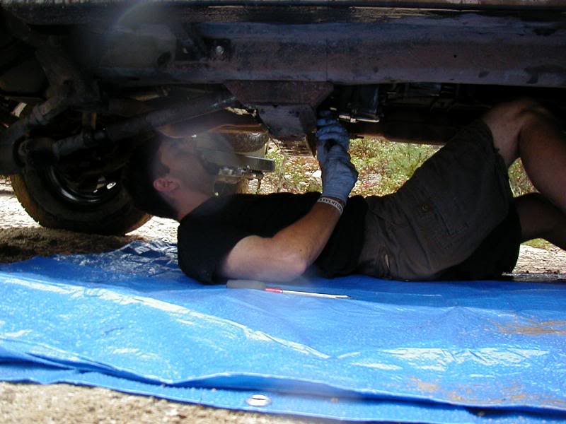 Chris fixing t-c ase lever by forcing it into 4-lo