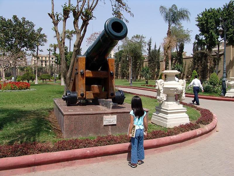 Various military weapons are displayed in the courtyard...