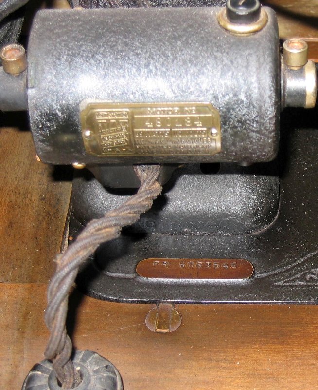 Location: Behind Pillar on Plaque Below Motor