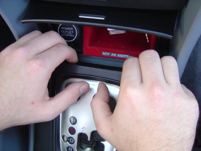 First, use both hands in order to pry up the front of t...