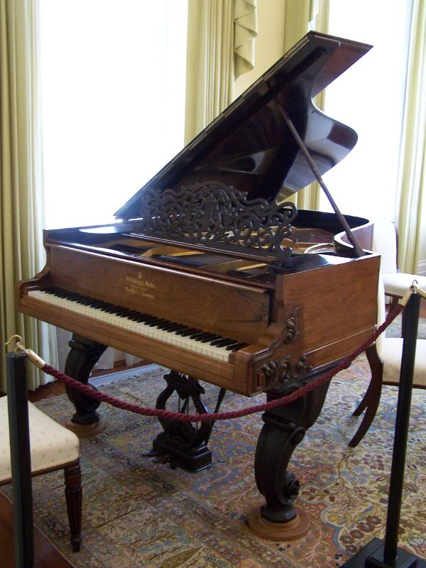 Antique Carved Grand Piano at Brandon Hall
