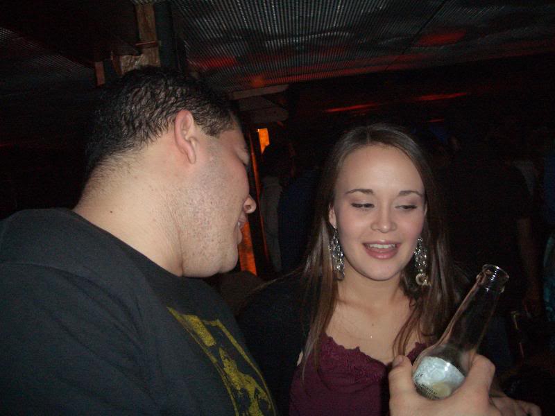 Doesn't it look like hes trying to pick her up?