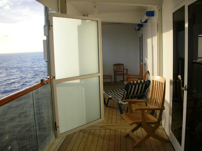 Balcony partition opened beetween our room 7301 and my ...