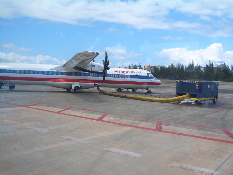 Our plane in San Juan being prepped with A/C before the...