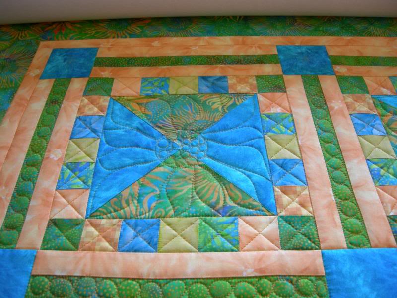 closeup of block quilting - Penni's batik sunflower qui...