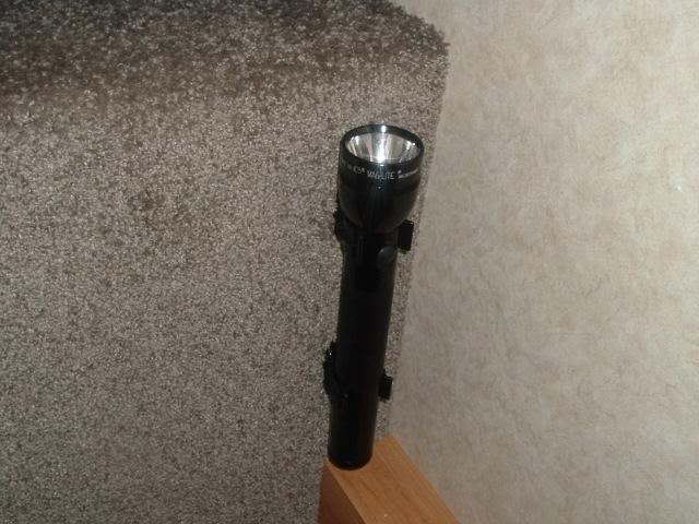 Mag-Lite Flash Light, next to bed