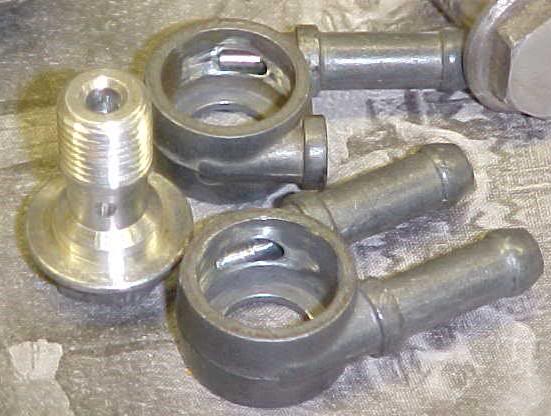 Fuel inlet fittings enlarged and deburred. Banjo bolts ...
