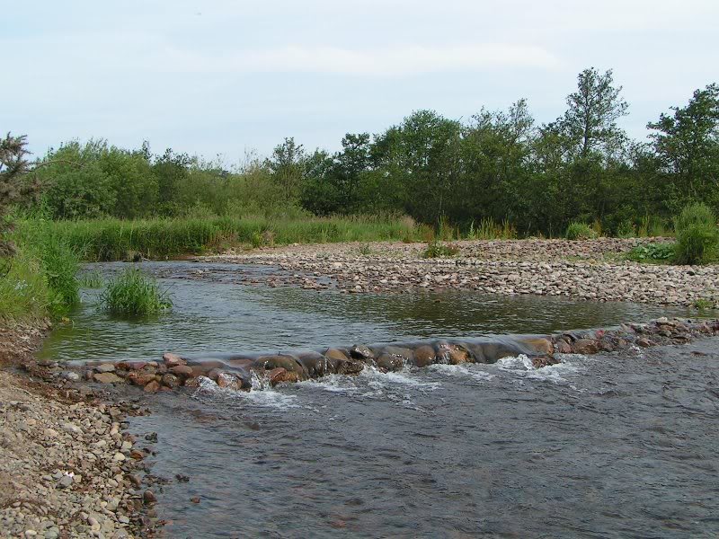 The lovely River Breamish runs along one of the site bo...