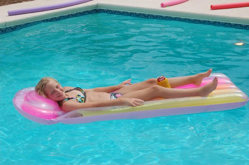 hannah relaxing in the pool