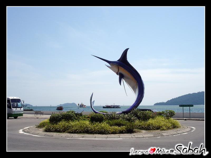 �������a��