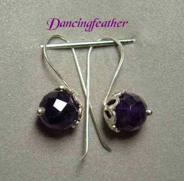 Amethyst, beautifully faceted, with Bali bead caps