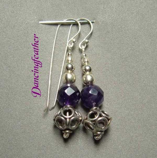 Amethyst, beautifully faceted, with lacey Bali beads an...