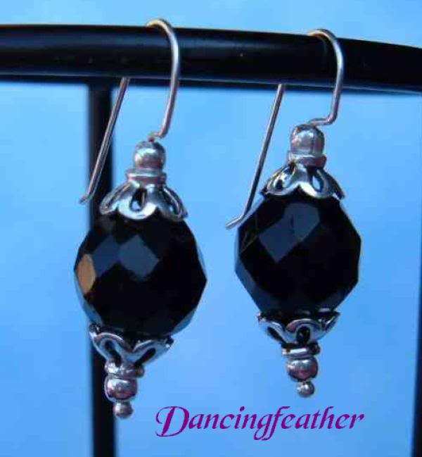 Jet black faceted crystals, capped with Bali and sterli...