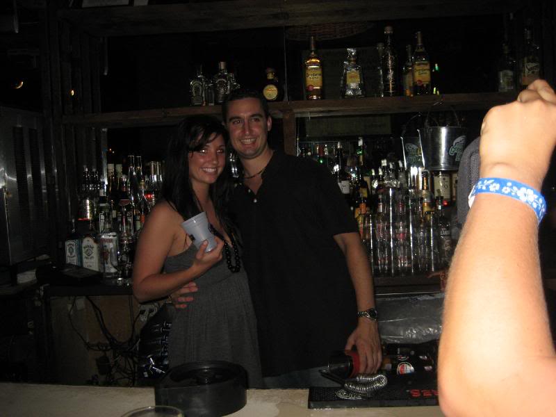 erica doing her thing bartending... aka free drinks for...