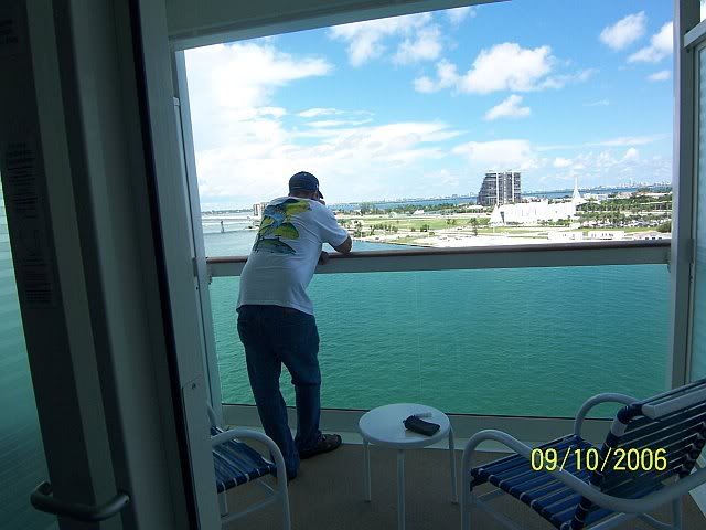 Rich looking out over balcony