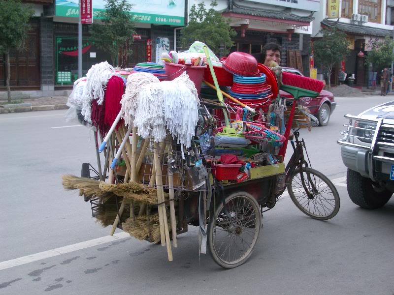 ���M�����f