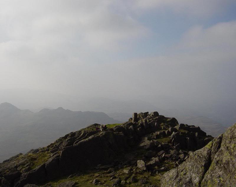 The summit of Harter Fell and the strong haze in the di...