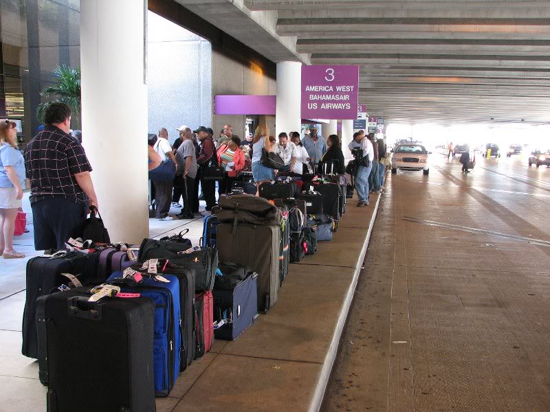 Luggage lined up, waiting for the shuttle