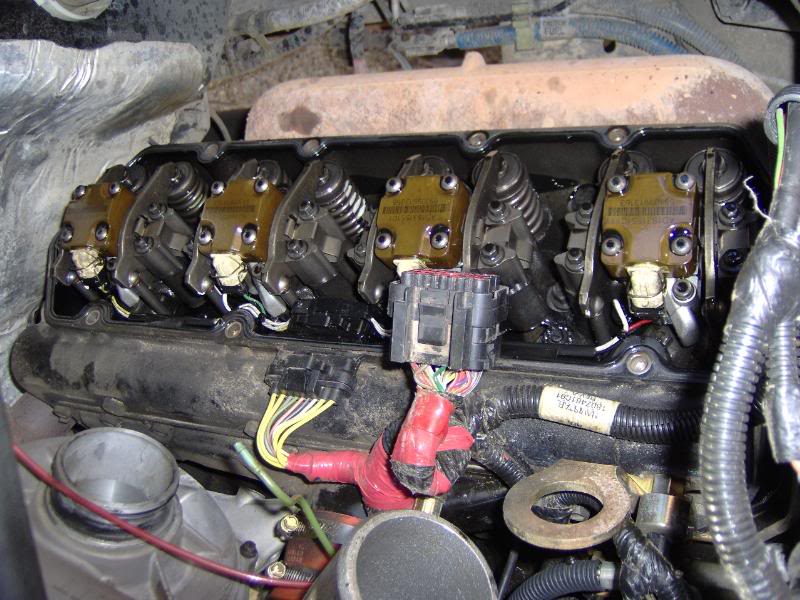 3 Valve Cover Off. Injectors Solenoids Exposed