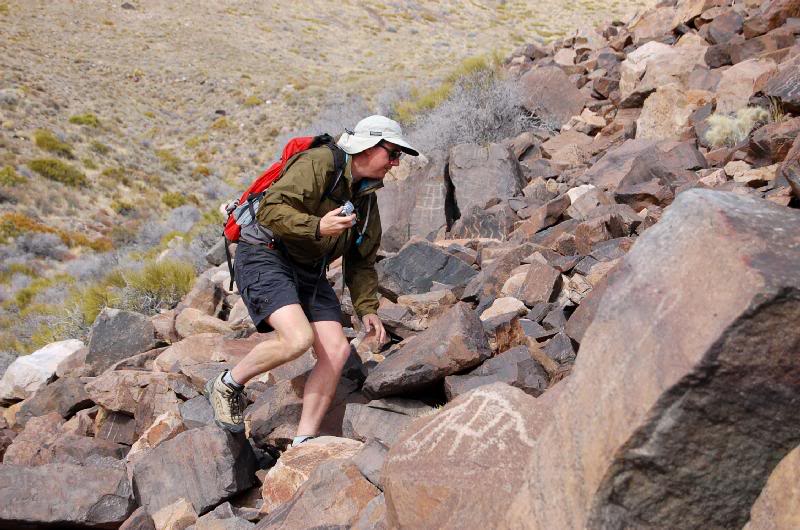 John climbing around the glyphs