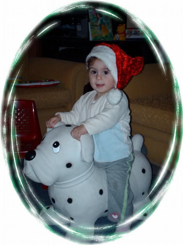 baby santa claous riding