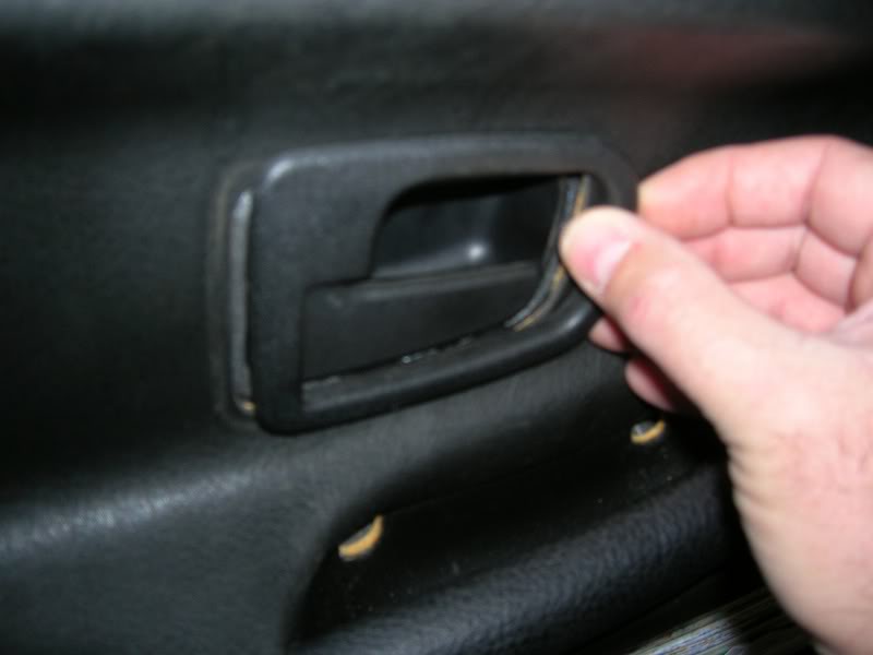 Remove trim facia from door handle
