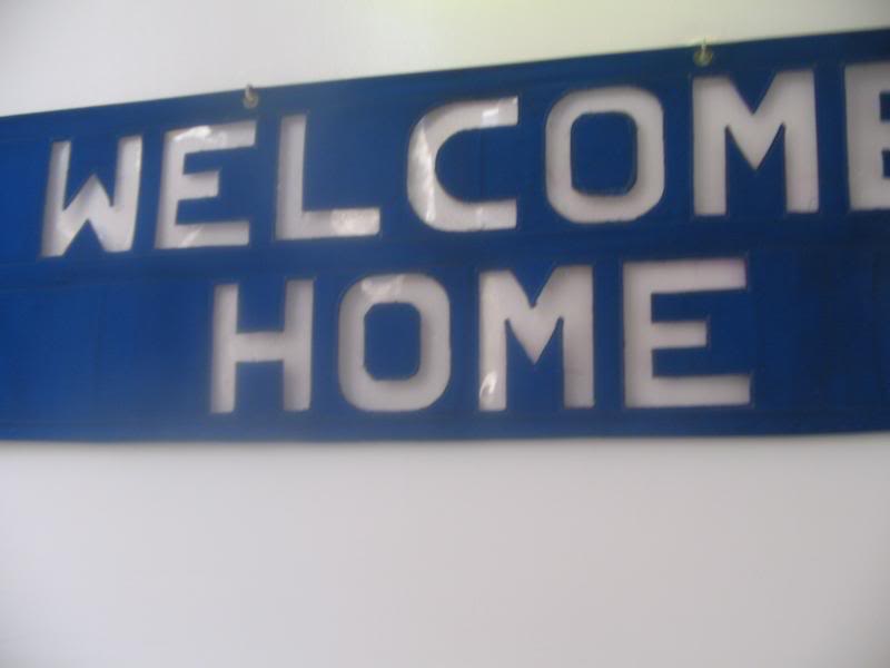 "Welcome Home" sign on the ship as you embark